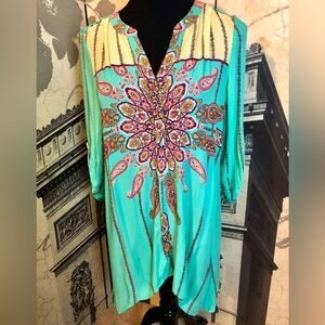 Beautiful blouse by Cupio in size medium